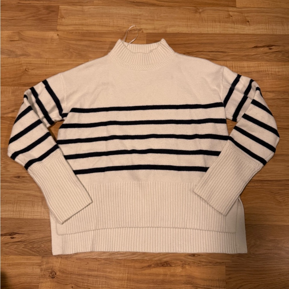 Elegant Cream and Black Striped Women's Turtleneck Sweater